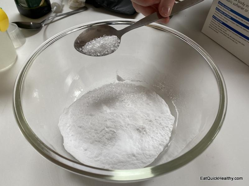 adding epsom salts to baking soda in easy bath bomb recipe kids